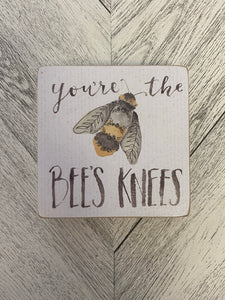 Bees knees sign